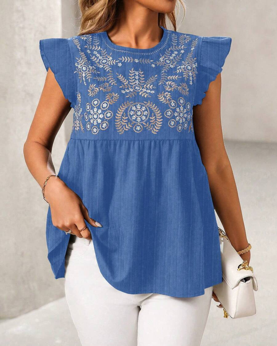 Elegancka bluzka damska z koronką i luźnym krojem