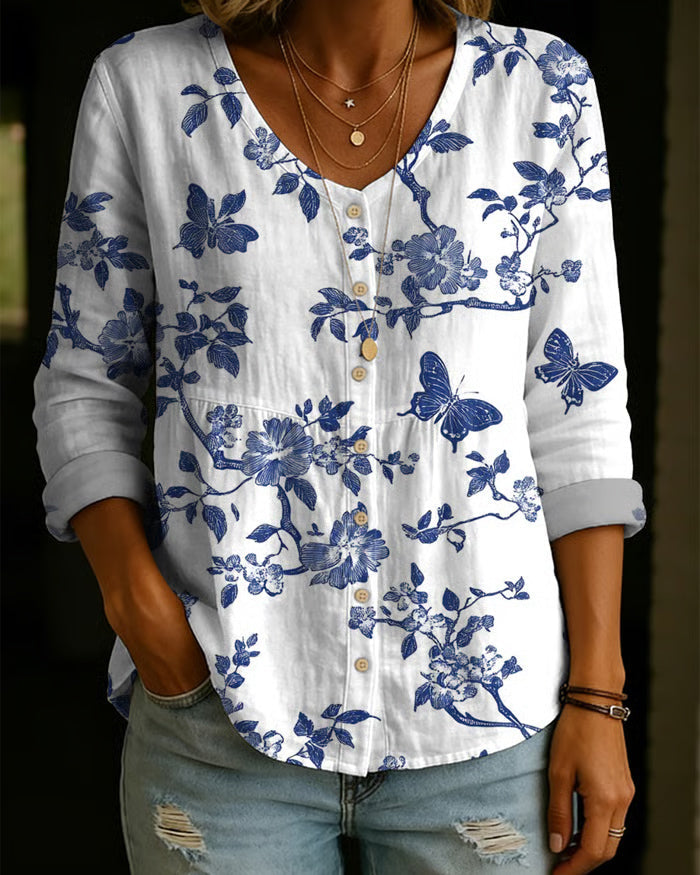 Lekka koszula damska w kwiaty z dekoltem V i guzikami