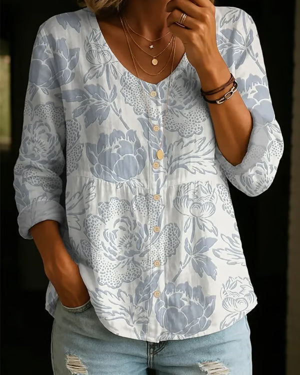 Lekka koszula damska w kwiatowy wzór z dekoltem V i guzikami