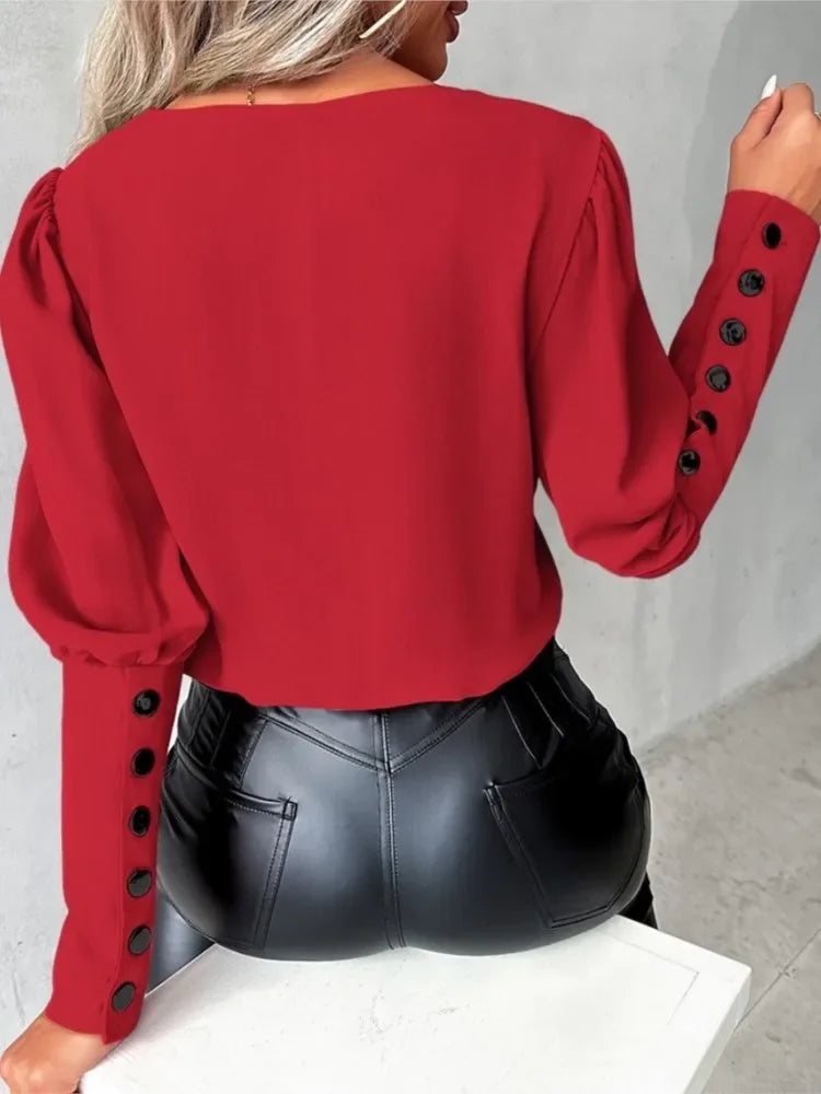 Elegancka Bluzka z Dekoltem V i Guzikami na Rękawach Dopasowany Krój